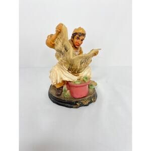 Vintage Resin Figure Sitting on Crate Working with Apples, Reading a Newspaper